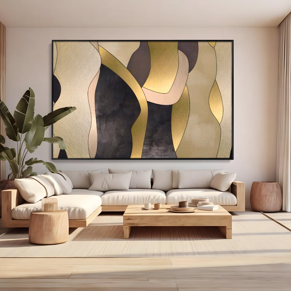 Tablou canvas cu tablou canvas cu forme abstracte aurii, in rama de aluminiu negru, pe perete intr-un living